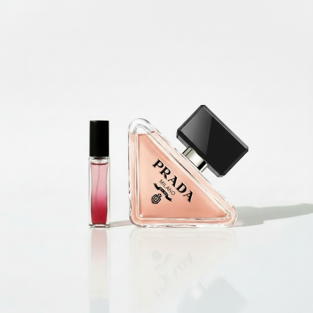 Prada Paradoxe with pink-to-red gradient sample vial on white background